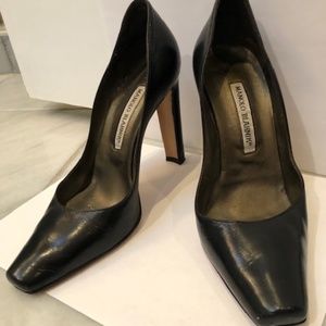 Manolo black leather pumps